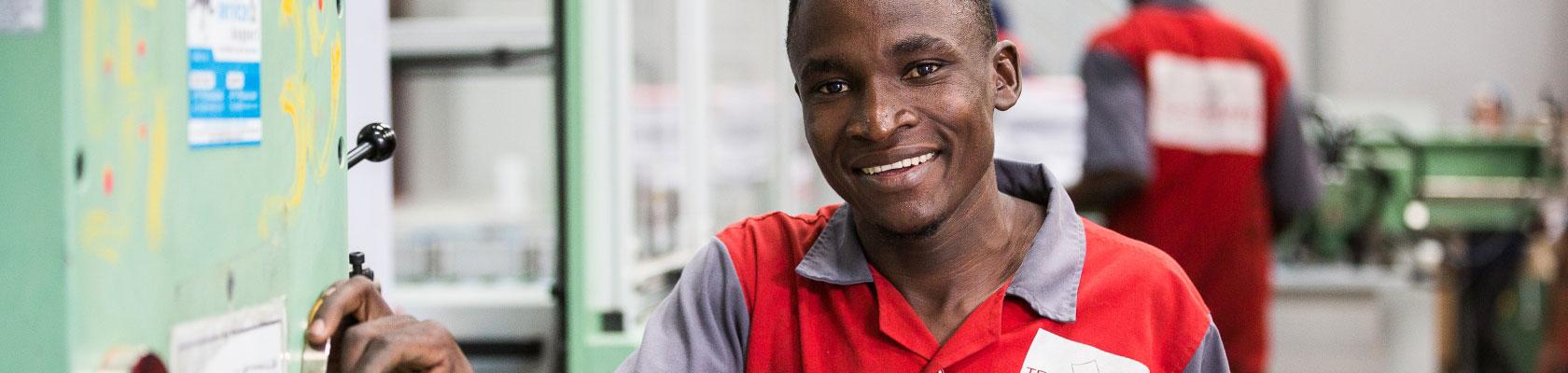 factory Transpaper, Kampala, Uganda, worker