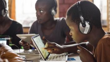 Burundi students using a portable media library near Bujumbura, provided by Libraries without Borders