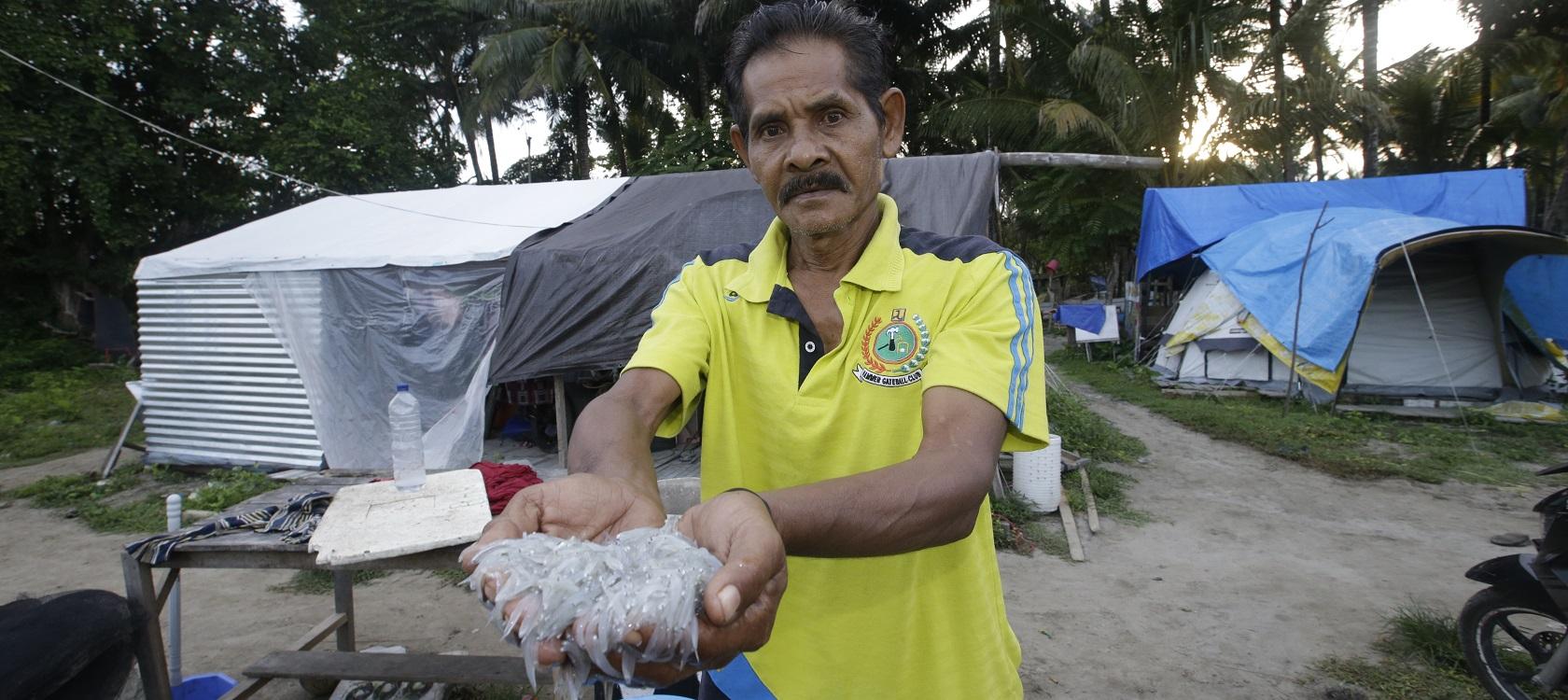 fisherman Palu Indonesia fishing sea ocean AFD