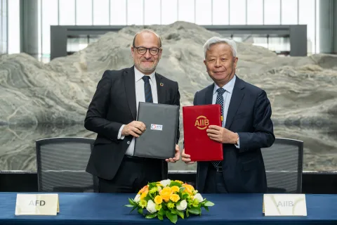 Remy Rioux CEO of AFD and Jin Liqun, AIIB President and Chair of the Board.